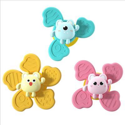 China LQQ1277 Baby Spinning Sucker Toys Suction Cup Spinning Cup Cartoon Windmills Teether Baby Gyro Plastic Top Spinning Toy for sale