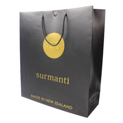 China Recycled Materials Boutique Packaging Box Black Paper Bag for sale