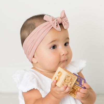 China Elastic Cotton Bownot Flower Baby Headband Hair Bands for Toddler and Newborn Children for sale