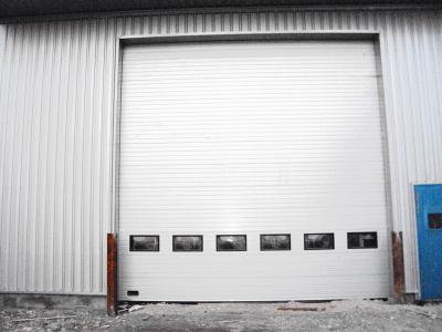 Chine 2 Class Air Permeability Industrial Speed Sectional Doors à vendre