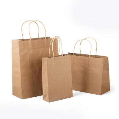 China Custom Moisture Proof Kraft Paper Bag Twisted To Handle Shopping Carrier Bag Recycled Kraft Paper Bags With Logo for sale