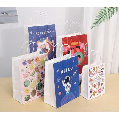 China Recyclable Gold Stamping Printed Gift Shopping Paper Bags White Gift Bag Luxury Shopping Packaging Packaging With Printed Logos for sale