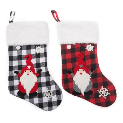 China Forester Polyester Fiber Plaid Christmas Socks Faceless Bag Christmas Gift Decorative Candy Socks for sale