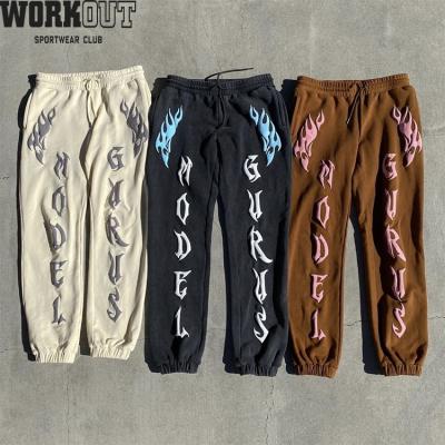 China Anti-pilling WORKOUT custom logo puff print pants jogger pants for men jogging stacked sweatpants men for sale