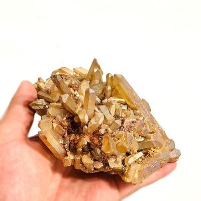 China Wholesale Titanium Orange Calcite Crystal Quartz Plating China Raw Ore Crystal Cluster Home Decoration for sale