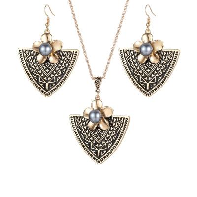 China Hot Selling Cheap Retro Jewelry Set Retro Hawaiian Triangle Earrings Necklace Set For Women for sale