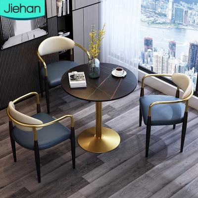 China Luxury Dining Tables And Chairs Edge Space Saving Manufacturer Heavy Duty Nordic Chinese Small Home Living Set With Metal Frame for sale