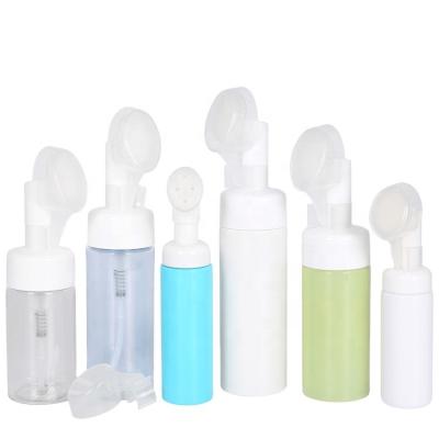 China BEAUTY PACKAGING Plastic Empty Soap PET Foamer Dispenser Foamer Pump Cleaning Bottle With Special Facial Cleansing Brush Design for sale