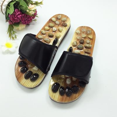 China 2017 Summer Acupoint Sole Hard Couple Unique Cool Slippers For Men And Women Health Shoes Foot Therapy Shoes Pebble Massage Slippers for sale