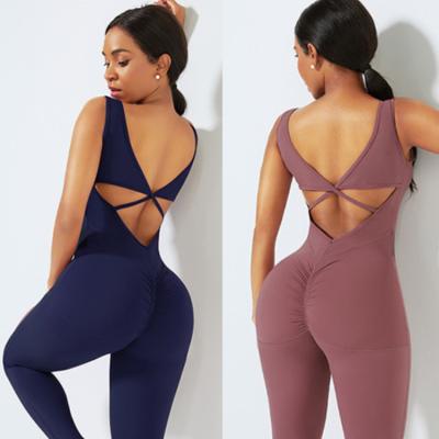 China New Style Water Resistant Sports Workout Yellow Jacquard Bandage Backless Bodycon Jumpsuit For Women for sale