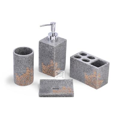 中国 Fashional Wholesale 4 Pcs Resin Bath Set With Toothbrush Holder Soap Dispenser For Hotel Use 販売のため