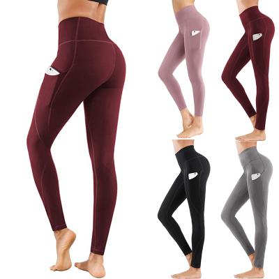 China Breathable High Waist Yoga Pants With Pockets Tummy Control Leggings Workout 4 Way Stretches Seamless Yoga Leggings for sale