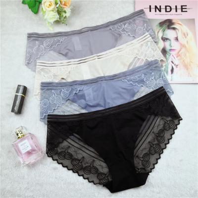 China Anti-Static Hollow See Through Sexy Lace Thong Panties Breathable Bikini Women's Panties Lace Up Underwear Sexy Ladies Lace Up Underwear for sale