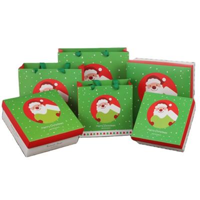 China Recycled Materials Shape Unique Santa Claus Set Round Folding High End Gift Paper Box Christmas Decoration Boxes for sale