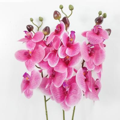 China PVC 55% Yarn 10%/Plastic 35%/Iron Artificial Orchids Hand Feel Moisture 8 Heads Peach-skin Velvet Phalaenopsis Simulation Orchids Home Decoration for sale