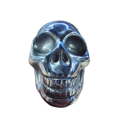 China Art Wholesale Natural Polished Crystal Art Illustration Folk Sculpture Open Terahertz Skulls For Decoration for sale