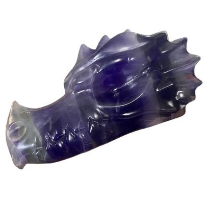 China Feng Shui Factory Price Natural Hand Carved Fluorite Purple Dragon Skulls Crystal Crafts For Decoration for sale