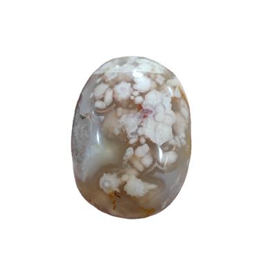 China Feng Shui New Arrival Natural Polished Crystal Pebble Sakura Agate Palm Stone Carving For Decoration for sale