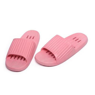 China Fashion trend plastic slides wholesale cheap price all seasons range and shower flat slides happy slippers feet slippers with your logo for sale