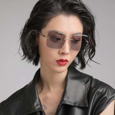 China Fashion New Fashion Sunglasses 2021 Fashion Women Sunglasses Frameless Frameless Setting Polarized Sunglasses For Women for sale