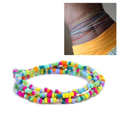 China Environmental Friendly African Waist Beads Belly Chain Body Jewelry Bohemian Style Elastic Colorful Rice Bead Waist Chain Body Chain for sale