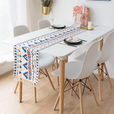 China Hot Selling Elegant Ethnic Style Waterproof Table Runner Tassel Polyester Table Runners For Home Decoration for sale