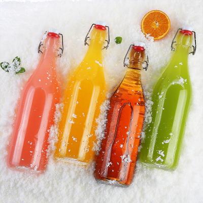 China Wholesale Free Sample 500ml Beverage Clear Swing Top Glass Beer Bottle For Juice Kombucha for sale