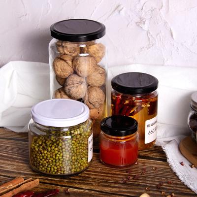 China Stocked high quality empty round glass jar 100ml 125ml 480ml 950ml with tinplate lid for jam pickles for sale