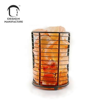 China OEM Modern Holiday Company Natural Hand Carved Himalayan Salt Crystals Lamp in Iron Cylinder Basket for sale