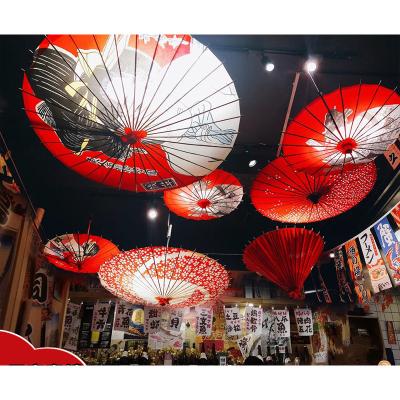 China Japandi Japanese Restaurant Waterproof Windproof Ceiling Umbrella Classic Decorative Wind Sakura Parasol Cheap Oilpaper Shade Umbrella for sale