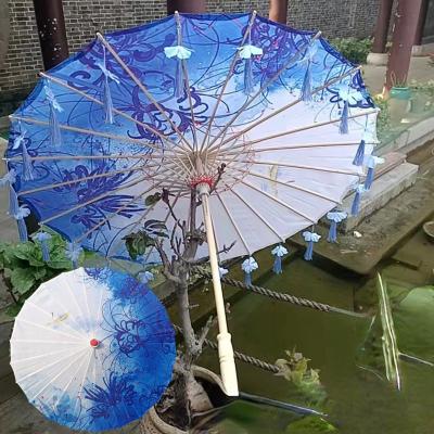 China Petal Modern Tassel Waterproof Beach Umbrella For Photography Silk Props Dancing Umbrella Sun Craft Fabric Parasol Floating Fairy Gift for sale