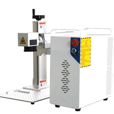 China Water Cooled MINI 50w Fiber Laser Marking Machine For Silver And Gold Metals Marking And Cutting Jewelry Business for sale