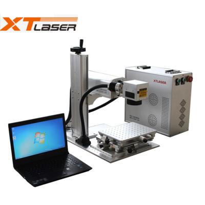 China Laser Marking XTLASER Fiber Laser Marking Machine for Engraving on Gold and Sliver, Portable Laser Marking Machine for sale