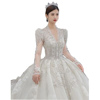 China Luxury Sexy V-Neck Dry Cleaning Lace Long Sleeve Dress Hot Sale Item Custom Made Wedding Fashion Women White Bride Dresses OEM Anti for sale