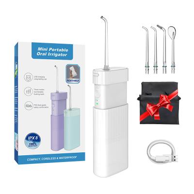 China Hotel New Design Water Jet 140ml Electric Smart Portable Dental Flosser Travel Tooth Cleaning for sale