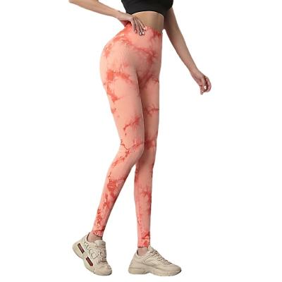 China Sustainable Tie-dye sports fitness trousers for women high-waisted peach butt lift seamless outer wear jacquard running fitness yoga pant for sale