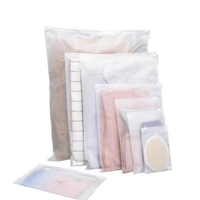 China Strong Adhesive Transparent Frosted Wholesale Zipper Bag Garment PE Zipper Bag Packaging Bag for sale