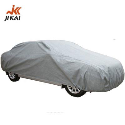 China Durable Car Cover Fabric Nonwoven Multilayer Full Body Outdoor Parking Waterproof Cover for sale