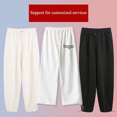 China Anti-Wrinkle Custom Trend Tied Leg Pants Printed Logo Solid Color Pants Casual Personality Customized Straight Pants for sale