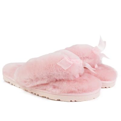 China Lightweight Fashionable Comfortable Plush Slides Home Wholesale Faux Indoor Cross Fur Women Slippers Fluffy Plush Slippers for sale