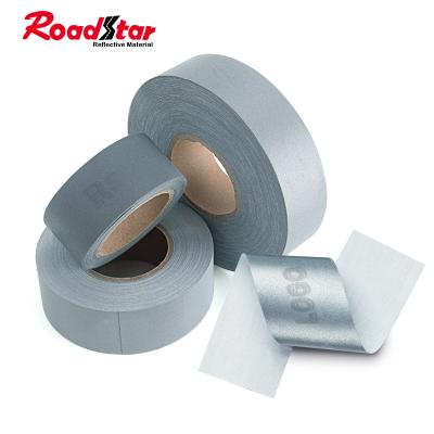 China Identify Printing Logo Embedded Laser Anti-Counterfeiting Tape Gray Reflective Material Fabric For Uniform for sale