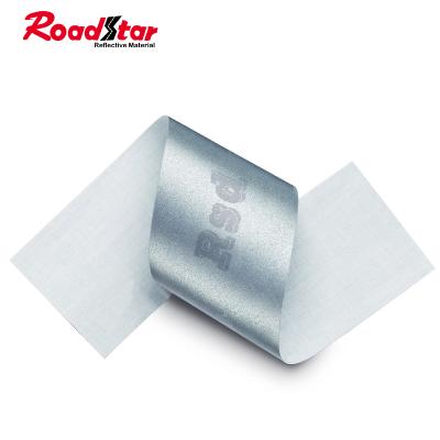 China Identify Logo Embedded Embedded Silver Sew On Custom Reflective Fabric Tape For Apparel for sale