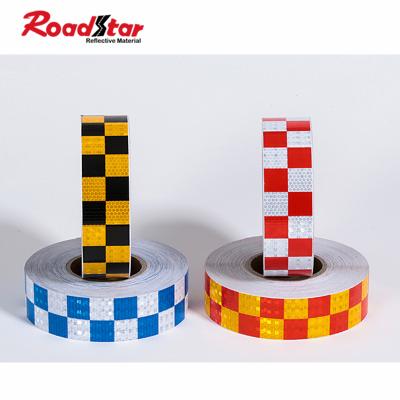 China Tearable Red and White Adhesive Checkered Reflective PVC Strip for Trailer for sale