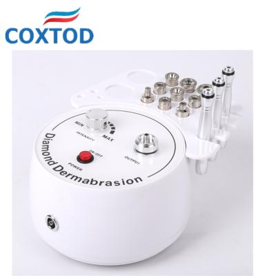 China Multifunctional Anti-Puffiness Dermabrasion Machine 3 in 1 with Sprayer Vacuum for Blotchy Spot Removal Microdermabrasion Machine Facial Diamond for sale