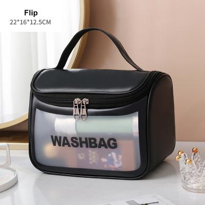 China 2022 Clear Treding Makeup Bag Large Capacity Storage PU Flip Case Silicone Cosmetic Bag PVC Waterproof Makeup Bag Black for sale