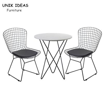 China Wire Metal Frame Dining Chairs And Table With Leather Cushion Black UK-LM006 for sale