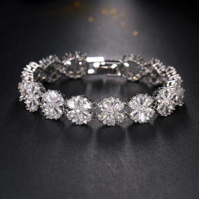 China FASHIONABLE Custom Luminous Flower Bracelet Accessories Little Water Drop Bracelets Zircon Mosaic Bracelet for sale