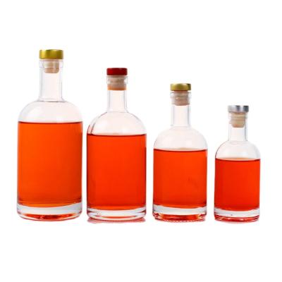 China Transparent Round Empty Beverage Vodka Tequila Bottle 200ml 500ml 750ml 1000ml Flint Glass Liquor Wine Whiskey With Cork Lid Sealed for sale