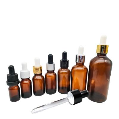 China Personal Care 5ml 10ml 15ml 20ml 30ml 50ml 60ml 100ml Clear Color Round Perfume Essential Oil Bottles Glass Dropper Bottle Amber With Pipette for sale