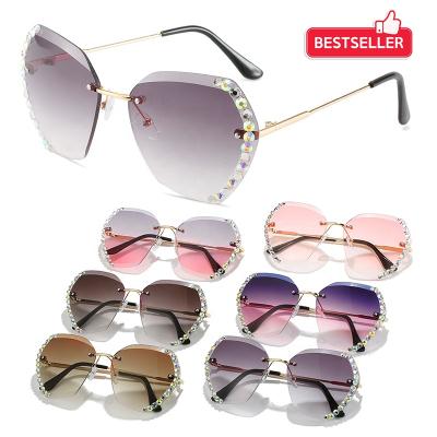 China 2022 oversized rimless bling vintage custom made women china manufacturer uv400 bling sunglasses women new arrival gradient tinted sunglasses shades for sale